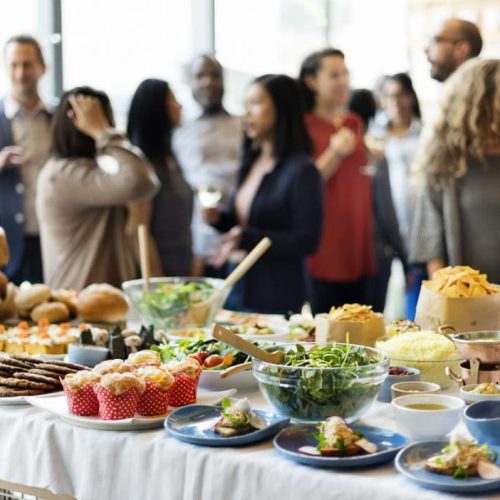 A table of food at a networking event